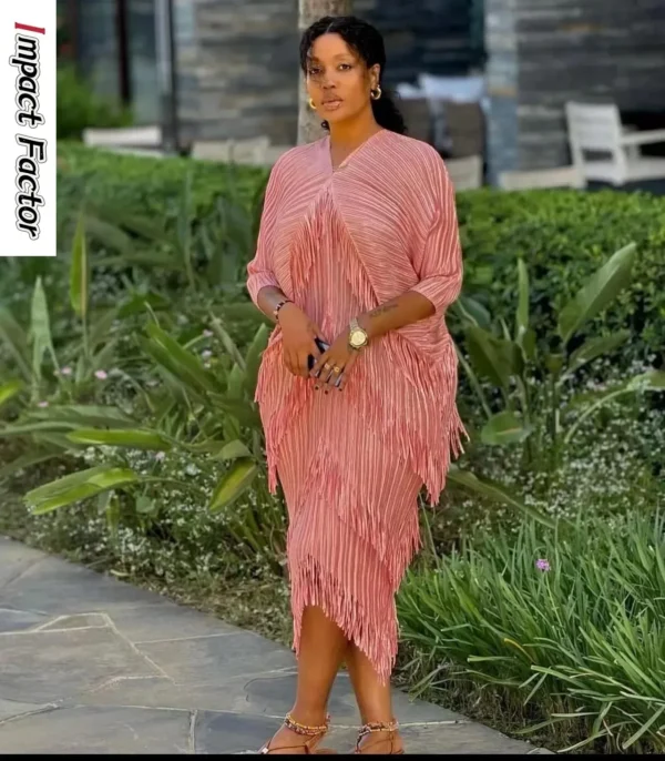 Pink homecoming dress with V-neck bat sleeve and fringed design