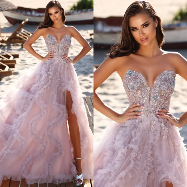 Pink homecoming dress with sweetheart neckline, beading, and split design